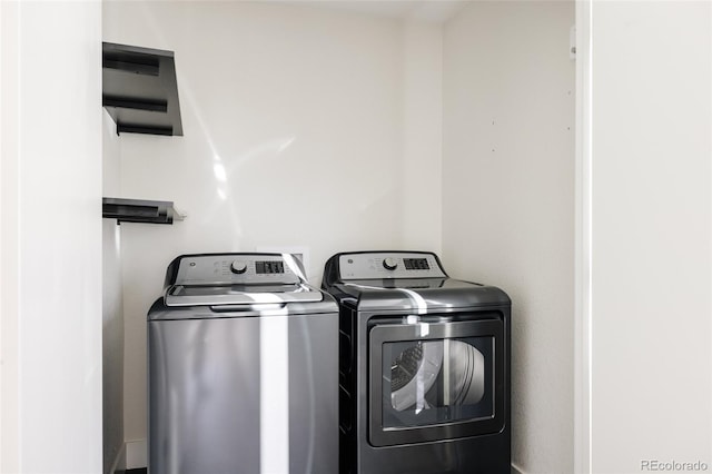 laundry area with washer and dryer and laundry area