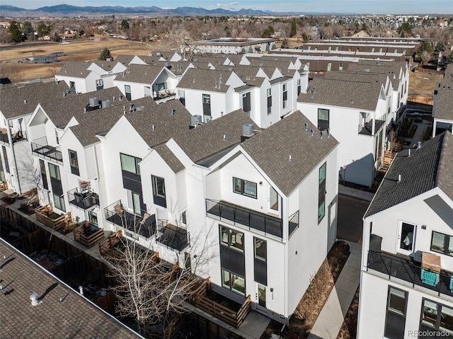 bird's eye view featuring a residential view and a mountain view