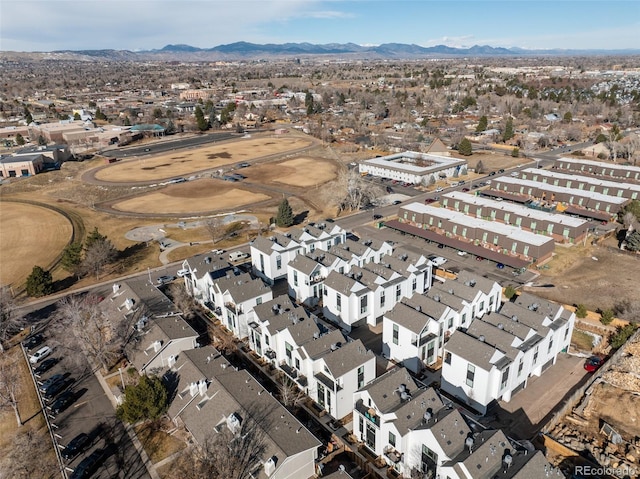 aerial view featuring a mountain view and a residential view