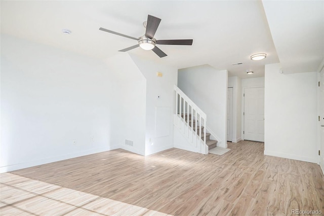 unfurnished room featuring ceiling fan and light wood-type flooring