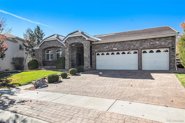 single story home with a garage