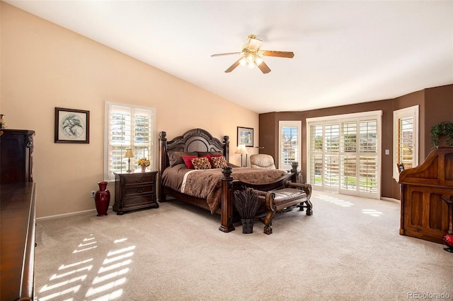 carpeted bedroom with access to outside, ceiling fan, and lofted ceiling