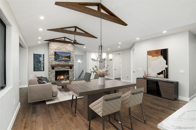 24701 US Highway 40, Golden, CO 80401 - dining space with a fireplace, dark wood-style floors, recessed lighting, and baseboards