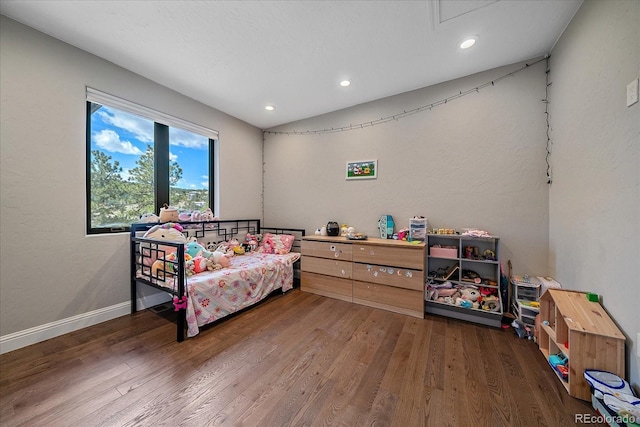 24701 US Highway 40, Golden, CO 80401 - bedroom featuring recessed lighting, wood finished floors, and baseboards