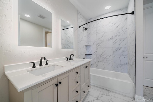 24701 US Highway 40, Golden, CO 80401 - bathroom with marble look tiles, bathtub / shower combination, double vanity, and recessed lighting