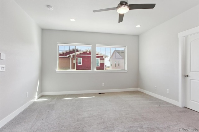 unfurnished room with recessed lighting, carpet, a ceiling fan, and baseboards