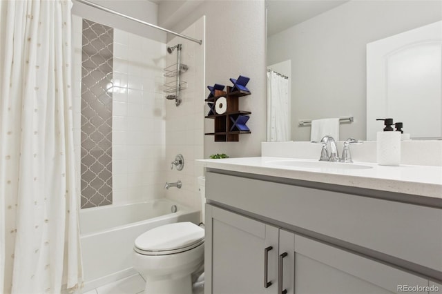 full bath featuring shower / bath combo, vanity, toilet, and tile patterned floors