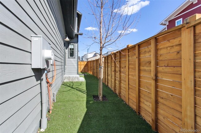 view of yard with fence