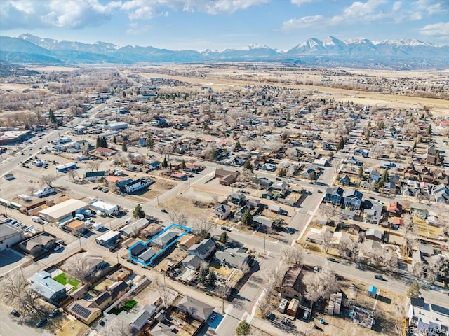 drone / aerial view featuring a mountain view