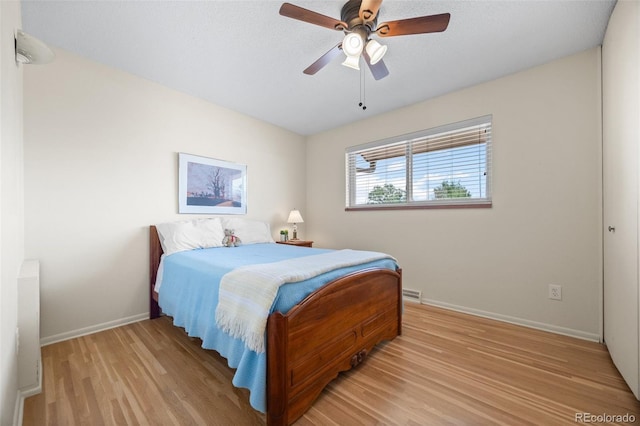 8205 Pennsylvania St, Denver, CO 80229 - bedroom with wood finished floors and a ceiling fan