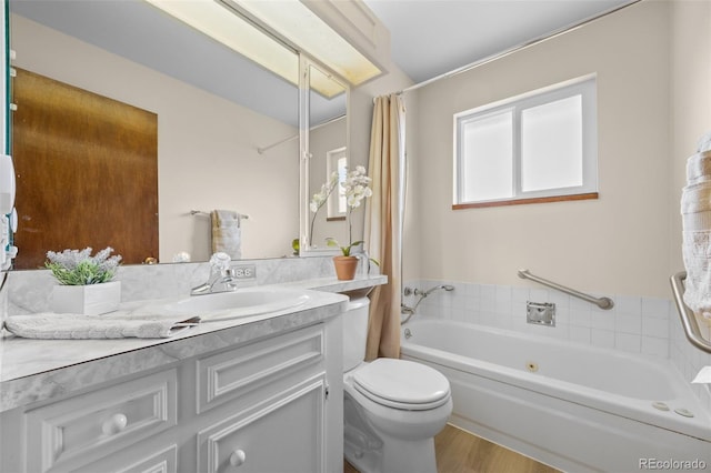 8205 Pennsylvania St, Denver, CO 80229 - bathroom featuring vanity and wood finished floors