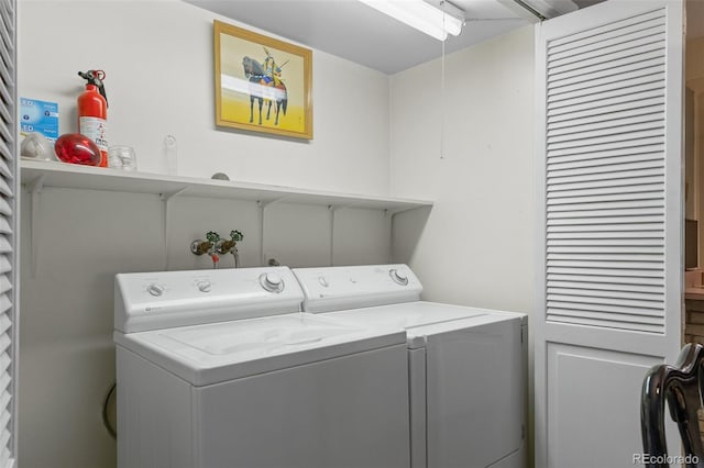 8205 Pennsylvania St, Denver, CO 80229 - washroom with independent washer and dryer