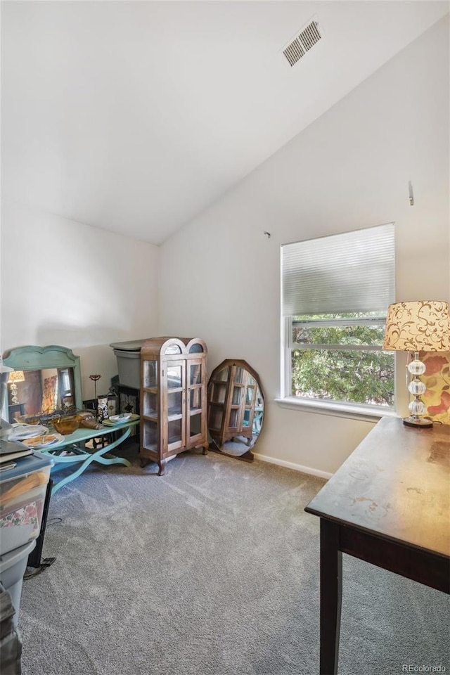 701 Harlan St Unit E29, Lakewood, CO 80214 - game room featuring vaulted ceiling, carpet flooring, and baseboards