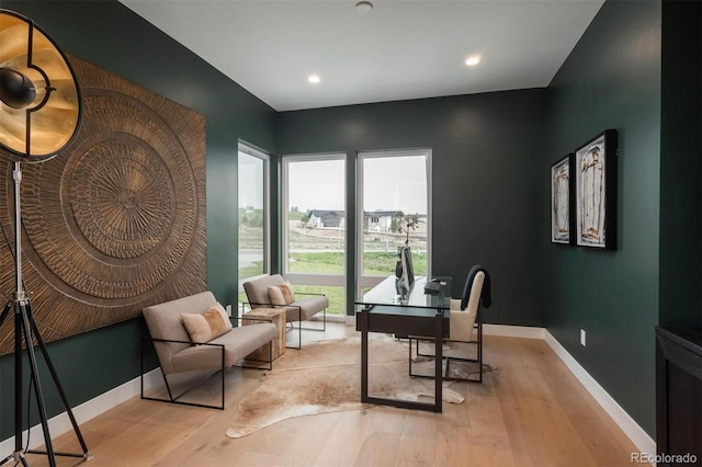 home office featuring recessed lighting, wood finished floors, and baseboards