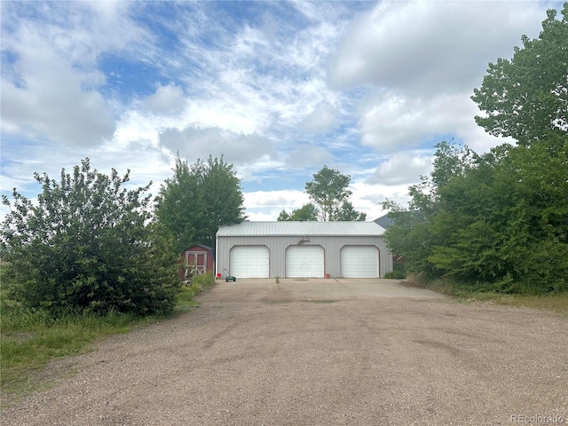 24938 County Road 18, Keenesburg, CO 80643 - detached garage with a storage shed