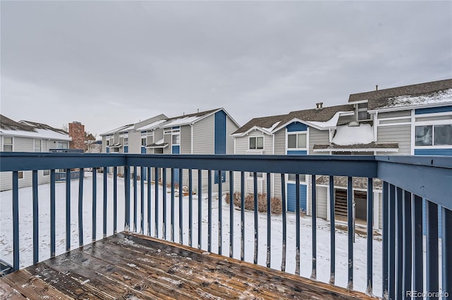 wooden terrace with a residential view