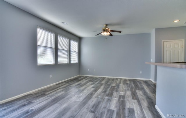 17205 Waterhouse Cir Unit C, Parker, CO 80134 - spare room with ceiling fan, dark wood-type flooring, and recessed lighting