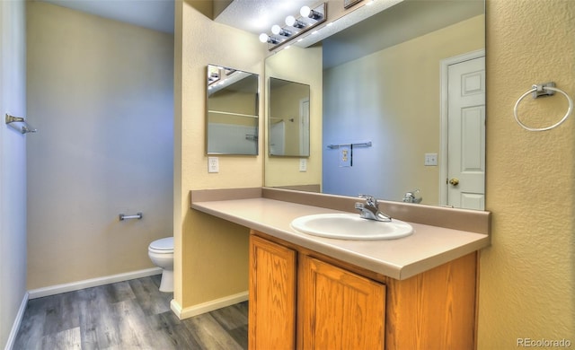 17205 Waterhouse Cir Unit C, Parker, CO 80134 - bathroom with wood finished floors and vanity