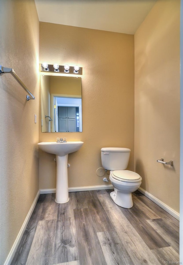 17205 Waterhouse Cir Unit C, Parker, CO 80134 - half bath with toilet and wood finished floors