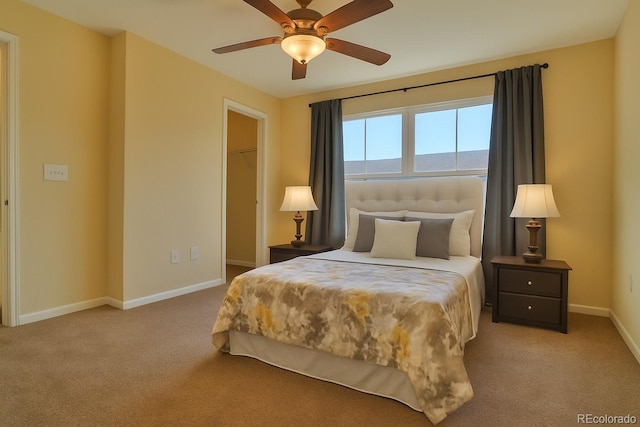 17205 Waterhouse Cir Unit C, Parker, CO 80134 - bedroom with carpet, a walk in closet, ceiling fan, and a closet