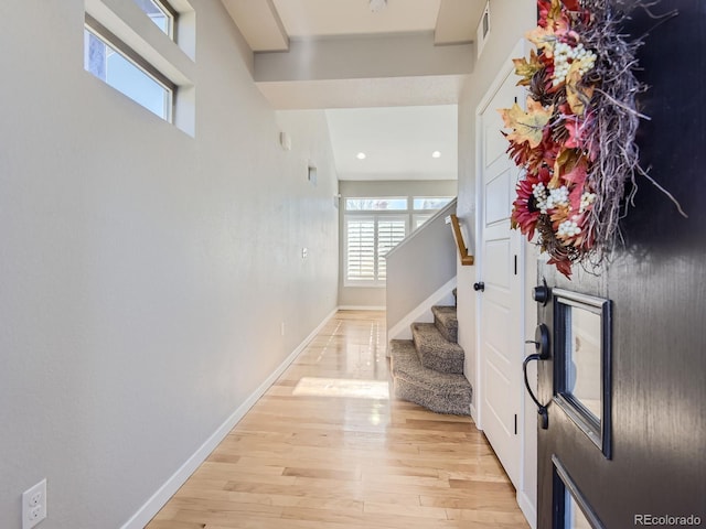 foyer with light hardwood / wood-style floors