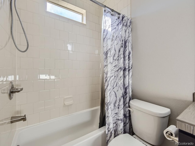 bathroom with shower / tub combo with curtain and toilet