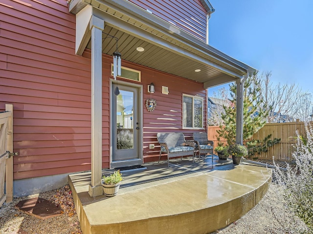 entrance to property with a patio area