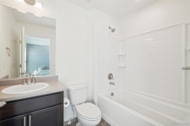 full bathroom featuring vanity, shower / bathtub combination, and toilet