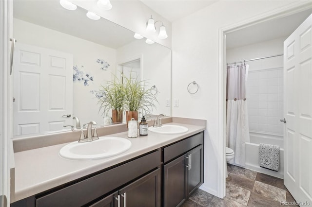 full bathroom with vanity, shower / bathtub combination with curtain, and toilet