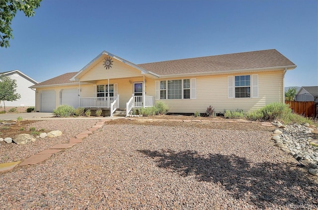84 Kathy Dr, Buena Vista, CO 81211 - ranch-style house featuring covered porch, an attached garage, and driveway