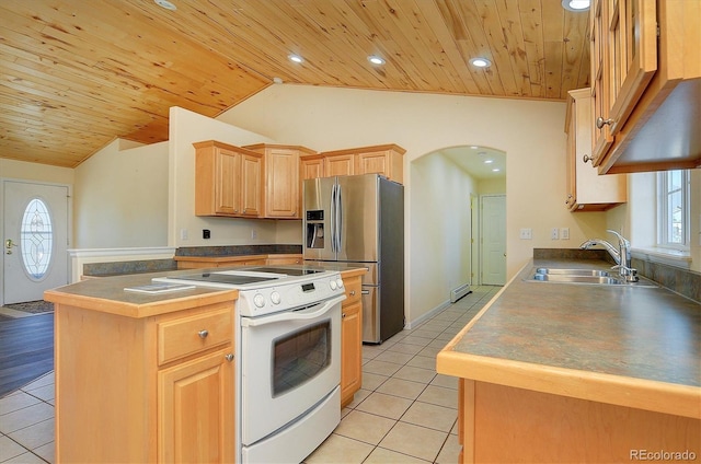 84 Kathy Dr, Buena Vista, CO 81211 - kitchen with white electric stove, stainless steel fridge, arched walkways, wooden ceiling, and light tile patterned floors