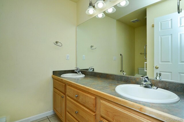 84 Kathy Dr, Buena Vista, CO 81211 - full bath with double vanity and tile patterned flooring