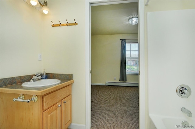 84 Kathy Dr, Buena Vista, CO 81211 - full bath with baseboard heating, vanity, and washtub / shower combination
