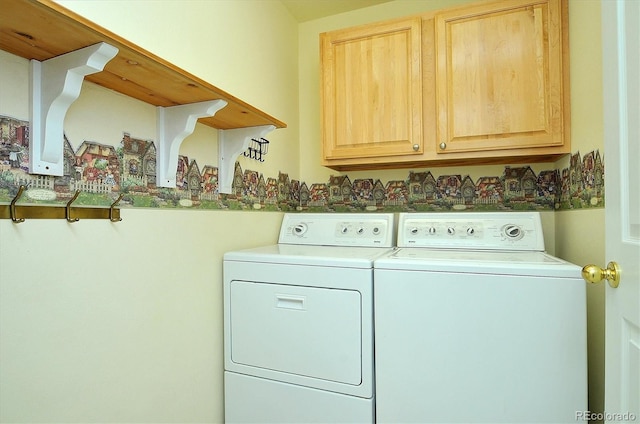 84 Kathy Dr, Buena Vista, CO 81211 - laundry area featuring washing machine and dryer and cabinet space