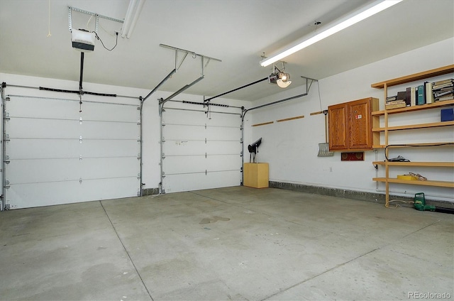 84 Kathy Dr, Buena Vista, CO 81211 - garage featuring a garage door opener