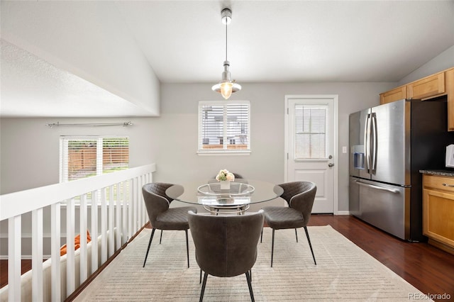 13906 Jackson St, Thornton, CO 80602 - dining area featuring dark wood-type flooring and lofted ceiling