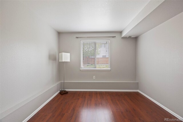 13906 Jackson St, Thornton, CO 80602 - unfurnished room with wood finished floors and baseboards