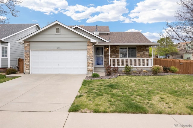 13906 Jackson St, Thornton, CO 80602 - single story home featuring stone siding, covered porch, and driveway