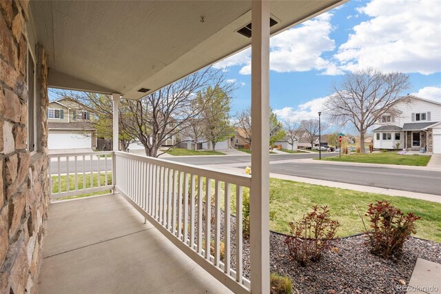 13906 Jackson St, Thornton, CO 80602 - porch with a residential view and a lawn