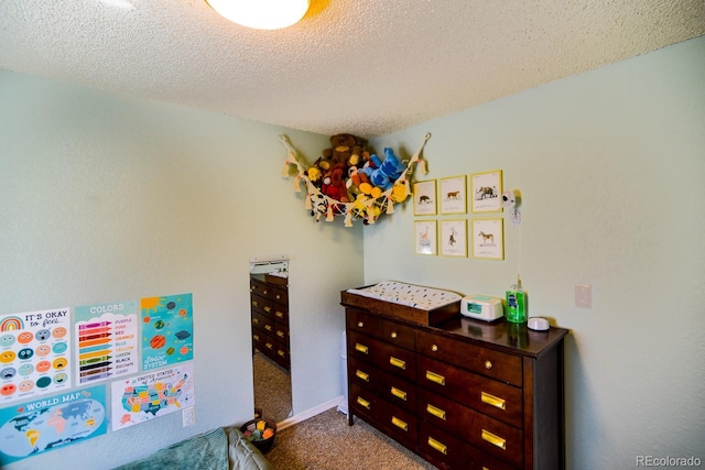 12498 W Prentice Dr, Littleton, CO 80127 - carpeted bedroom with a textured ceiling