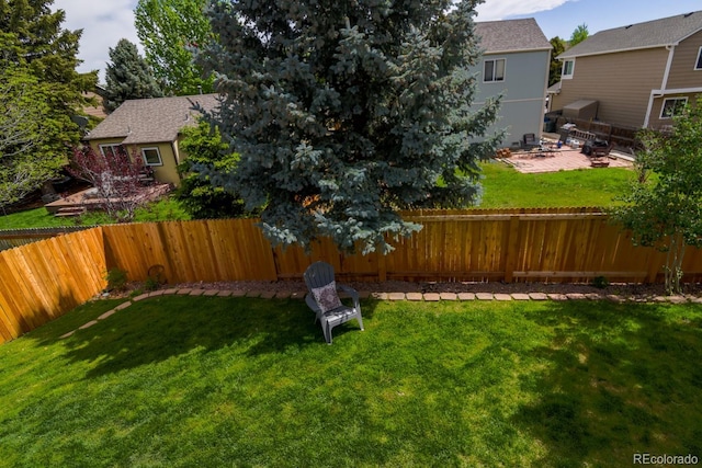 12498 W Prentice Dr, Littleton, CO 80127 - fenced backyard with a patio area