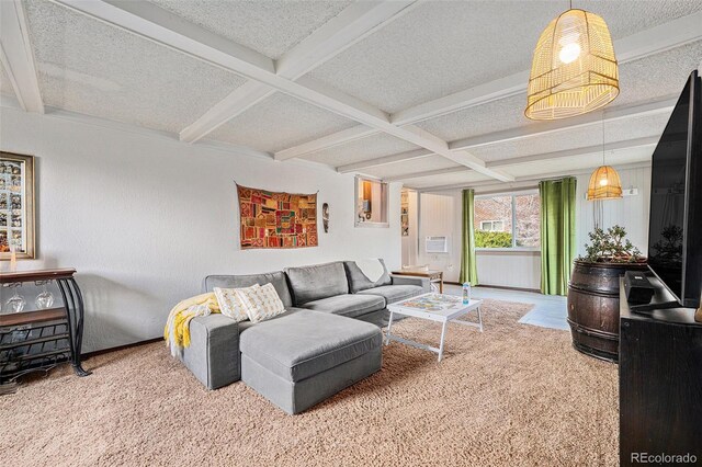 living area with beamed ceiling, coffered ceiling, and a textured ceiling