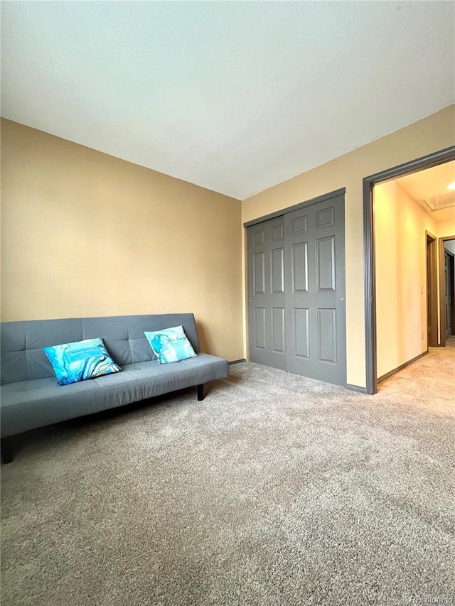 unfurnished room featuring light colored carpet