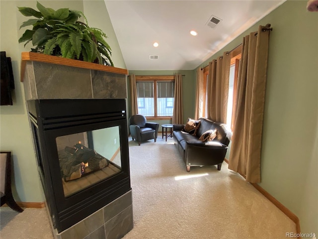 1145 S Williams St, Denver, CO 80210 - carpeted living room with vaulted ceiling, recessed lighting, and a multi sided fireplace