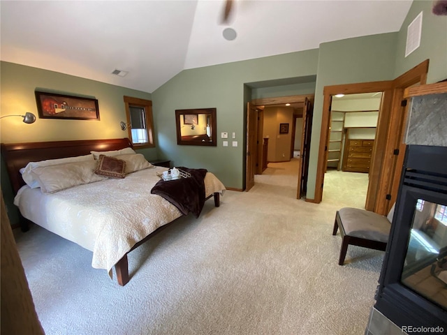 1145 S Williams St, Denver, CO 80210 - bedroom featuring light carpet, lofted ceiling, and a spacious closet