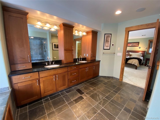 1145 S Williams St, Denver, CO 80210 - ensuite bathroom featuring double vanity and tiled shower