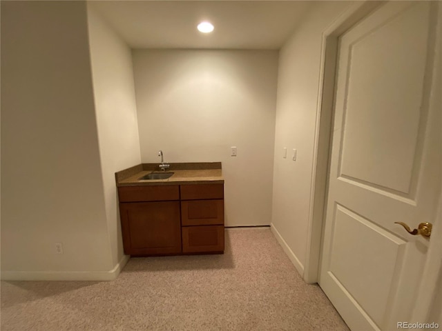 1145 S Williams St, Denver, CO 80210 - indoor wet bar with recessed lighting and light colored carpet