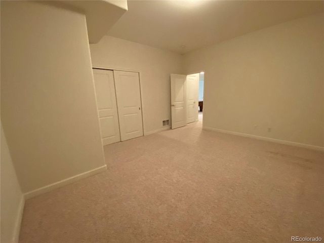 1145 S Williams St, Denver, CO 80210 - unfurnished bedroom featuring light colored carpet and a closet