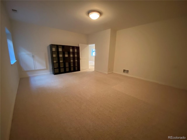1145 S Williams St, Denver, CO 80210 - empty room with carpet floors and baseboards