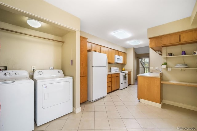 3330 Templeton Gap Rd Unit 15, Colorado Springs, CO 80907 - laundry area featuring independent washer and dryer and baseboards
